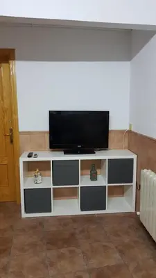 Una televisión o centro de entretenimiento en Apartamento turístico Dayma 2