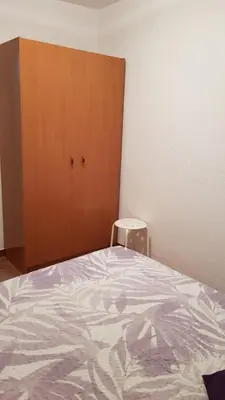 Cama o camas de una habitación en Apartamento turístico Dayma 2