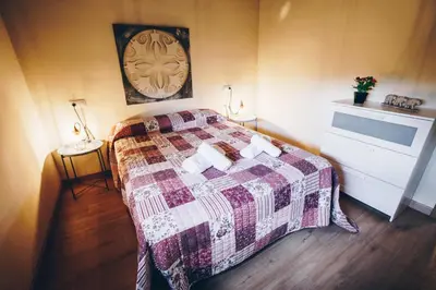 Cama o camas de una habitación en Complejo Roma