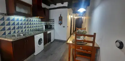 Una cocina o zona de cocina en Apartamentos Rurales El Zarzo