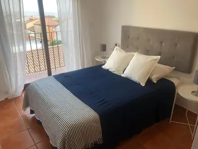 Cama o camas de una habitación en APARTAMENTOS FUENTE ARRIBA