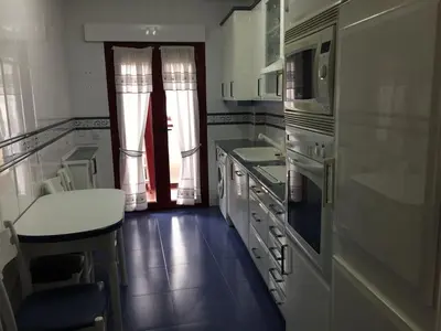Una cocina o zona de cocina en VIVIENDA DE USO TURÍSTICO CENTRO