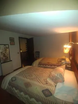 Cama o camas de una habitación en La Troje Oropesana