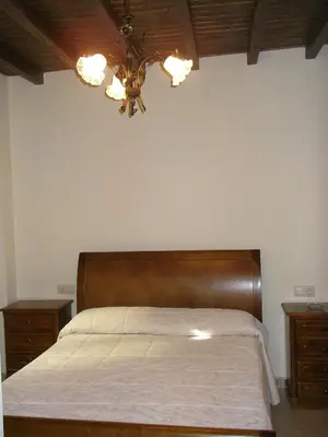 Cama o camas de una habitación en Apartamentos Los Hebiles