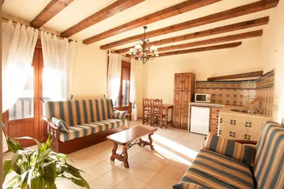 Una cocina o zona de cocina en Apartamentos Los Hebiles