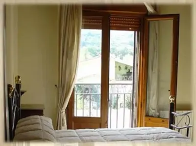 Cama o camas de una habitación en Apartamentos Los Hebiles