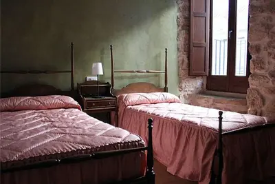 Cama o camas de una habitación en Aptos La Ceja, El Trampal y El Reloj by CASA BOLDO