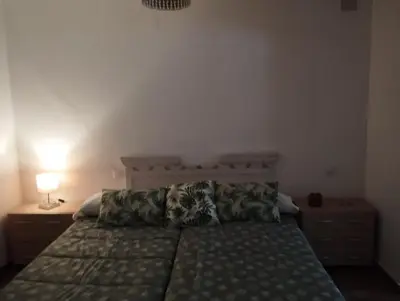Cama o camas de una habitación en ApartamentosTREVEJO La Noguera villamiel