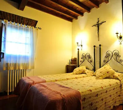 Cama o camas de una habitación en Casa Rural Finca Umbría