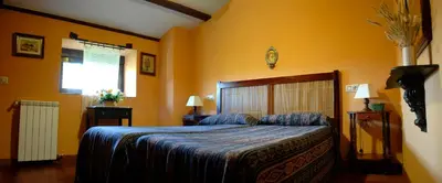 Cama o camas de una habitación en Casa Rural Finca Umbría