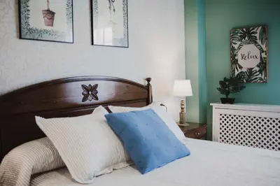 Cama o camas de una habitación en APARTAMENTO FRANCISCO PIZARRO