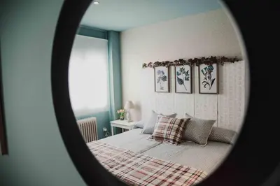 Cama o camas de una habitación en APARTAMENTO FRANCISCO PIZARRO