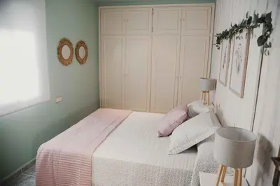Cama o camas de una habitación en APARTAMENTO FRANCISCO PIZARRO