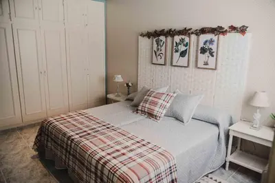 Cama o camas de una habitación en APARTAMENTO FRANCISCO PIZARRO