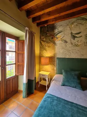 Cama o camas de una habitación en Posada Albarea