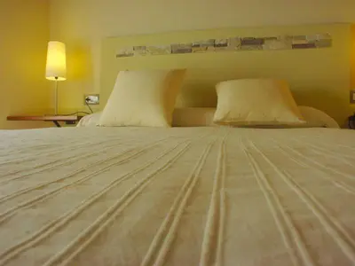 Cama o camas de una habitación en El Mirador de las Monjas