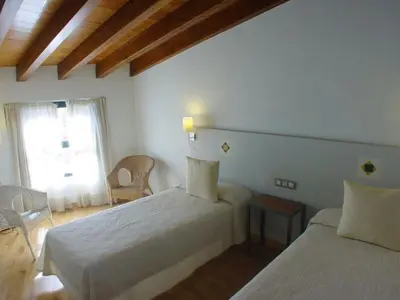 Cama o camas de una habitación en El Mirador de las Monjas