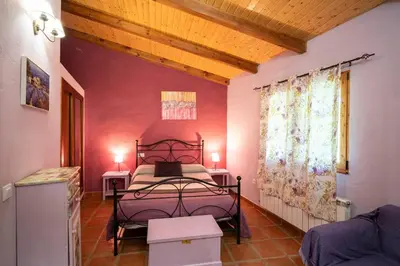 Cama o camas de una habitación en Chozos Rurales El Solitario