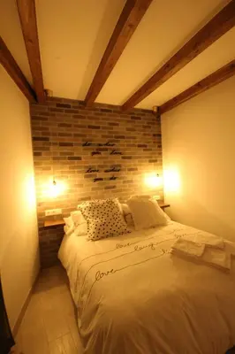 Cama o camas de una habitación en La Rosa de los Vientos