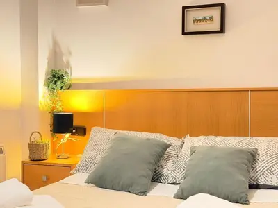 Cama o camas de una habitación en VUT Plaza Florida - Parking gratis