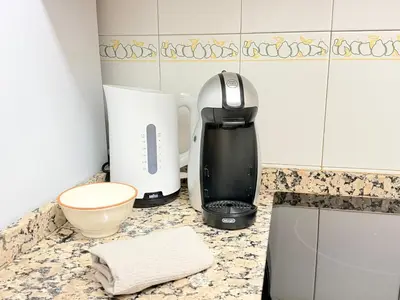 Una cocina o zona de cocina en VUT Plaza Florida - Parking gratis