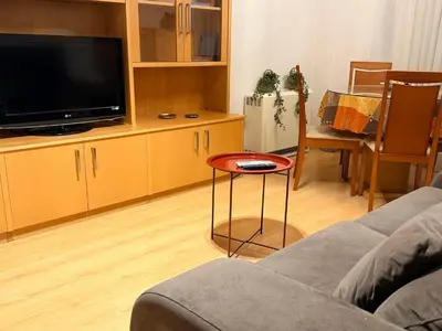 Una televisión o centro de entretenimiento en VUT Plaza Florida - Parking gratis