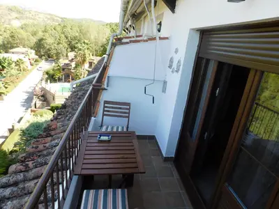 Un balcón o terraza de El pequeño capricho