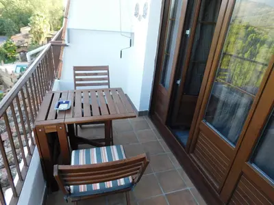 Un balcón o terraza de El pequeño capricho