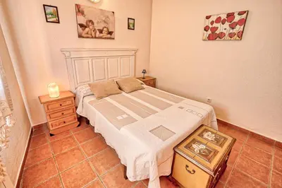 Cama o camas de una habitación en Apartamentos Rurales El Solitario
