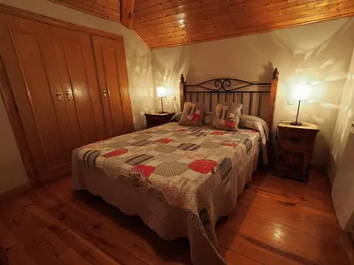 Cama o camas de una habitación en Núcleo de Turismo Rural Valle de Iruelas
