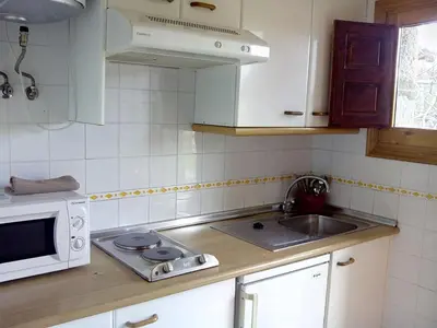 Una cocina o zona de cocina en Núcleo de Turismo Rural Valle de Iruelas