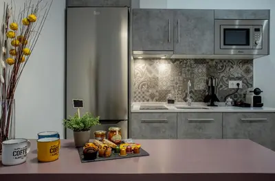 Una cocina o zona de cocina en Apartamentos Turísticos Moret11-1A