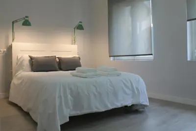 Cama o camas de una habitación en Las Covachuelas (VuT)