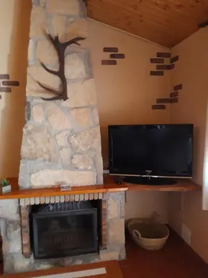 Una televisión o centro de entretenimiento en CASA RURAL GREDOS