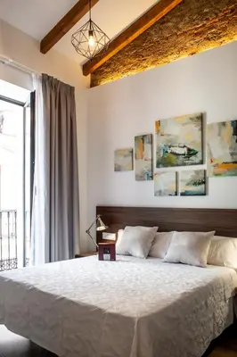 Cama o camas de una habitación en Apartamentos Turisticos Moret 11 - 2A