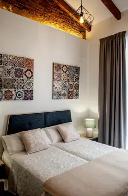 Cama o camas de una habitación en Apartamentos Turisticos Moret 11 - 2A