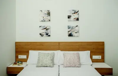 Cama o camas de una habitación en Apartamentos Turisticos Moret 11 - 2A