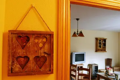 Una televisión o centro de entretenimiento en Casa Monica
