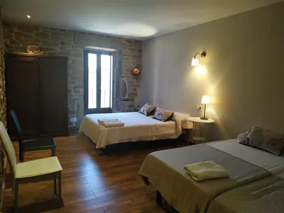 Cama o camas de una habitación en La Teodora