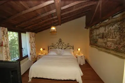 Cama o camas de una habitación en Posada Real Ruralmusical