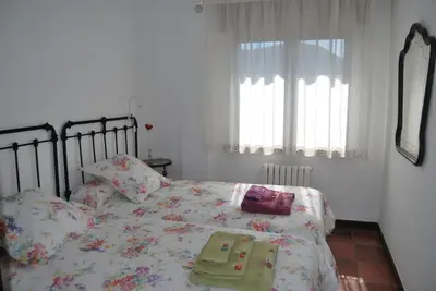 Cama o camas de una habitación en Casa Rural La Cuadraá