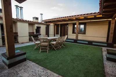 Un patio o zona al aire libre en Apartamentos Turísticos La Panadería de Flora
