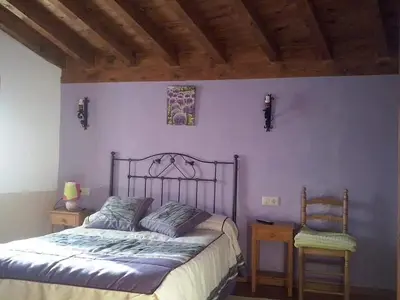 Cama o camas de una habitación en Casa Rural El Molinero