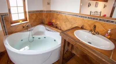 Un baño de Casa Rural El Molinero
