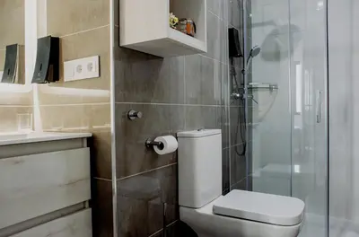 Un baño de Apartamentos Turísticos Moret 11 - 1C