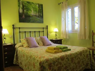 Cama o camas de una habitación en Casa Rural Fuente Tía Canora