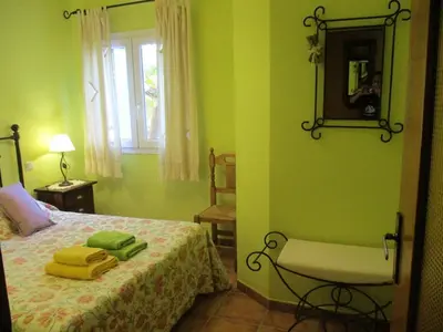 Cama o camas de una habitación en Casa Rural Fuente Tía Canora