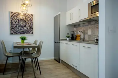 Una cocina o zona de cocina en Apartamentos Turísticos Moret 11 - 2B