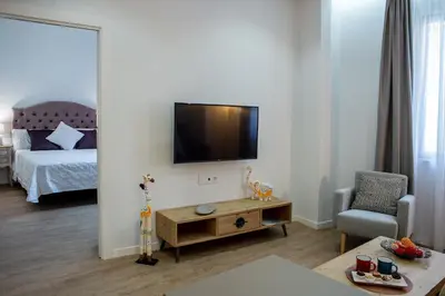 Una televisión o centro de entretenimiento en Apartamentos Turísticos Moret 11 - 2B