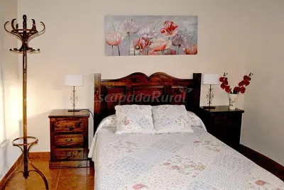 Cama o camas de una habitación en Casa rural LA DEHESA